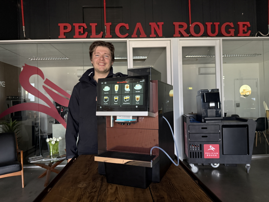 Jacob Pritchard Service Manager at Pelican rouge with the Dr Coffee F16 - office coffee machine