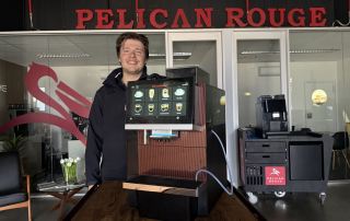 Jacob Pritchard Service Manager at Pelican rouge with the Dr Coffee F16 - office coffee machine